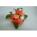 White Ceramic Milk Jug with Orange and Ivory floral arrangement of Lillies and Roses with Ribbon Bow